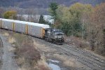 NS 9242 brings train 11J into Enola yard